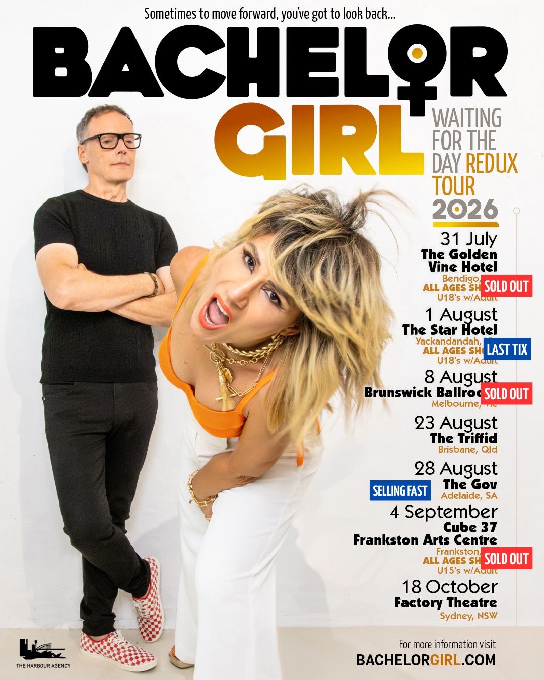 A man in glasses and black shirt stands beside a woman with blonde hair in an orange top against a white background, with tour dates listed.