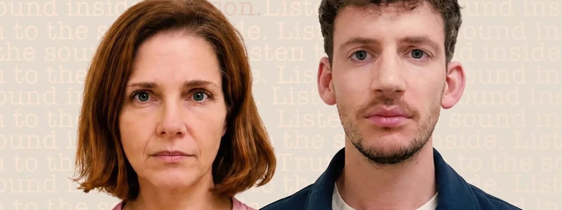 Woman in pink shirt and man in navy jacket face the camera against a neutral beige background.