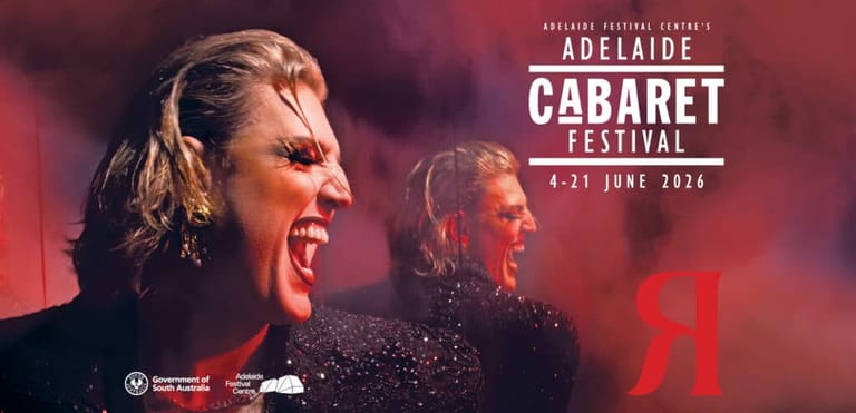 Woman performer mid-song under warm stage lighting at Adelaide Cabaret Festival 2026.