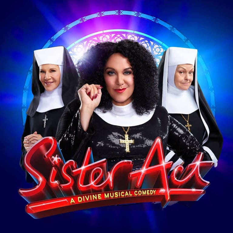 Three performers in nun costumes with crosses pose against a glowing blue and purple backdrop with red neon "Sister Act" lettering.