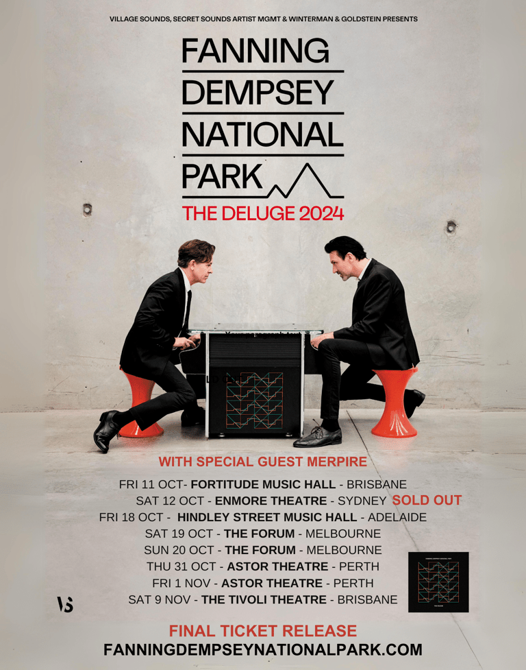 Two men in black suits crouch facing each other beside a black amplifier against a white wall, wearing red shoes, promoting Fanning Dempsey National Park's 2024 tour.