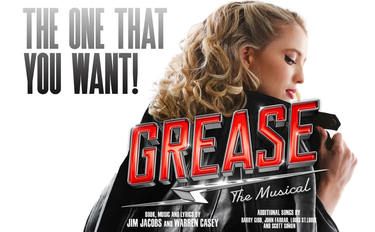 Woman in black leather jacket against Grease: The Musical promotional poster with bold red lettering.