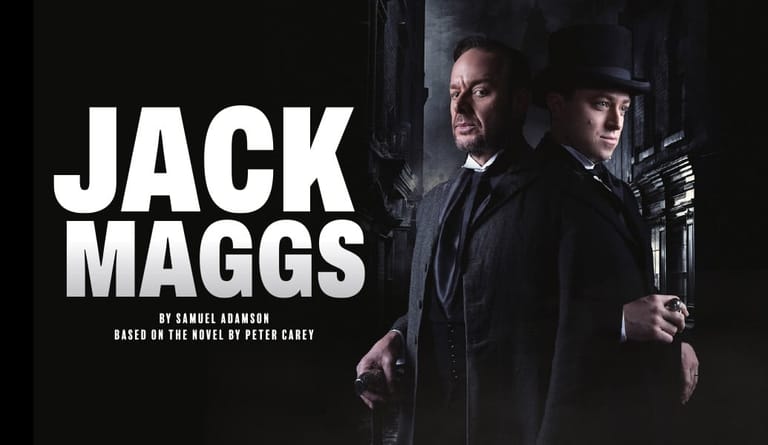 Two men in dark suits stand back-to-back in shadowy noir lighting, one holding a gun, with "JACK MAGGS" text overlay.