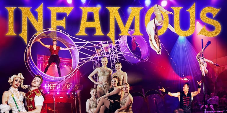 Multiple performers on stage under dramatic purple and pink lighting with neon signage reading "INFAMOUS" above.
