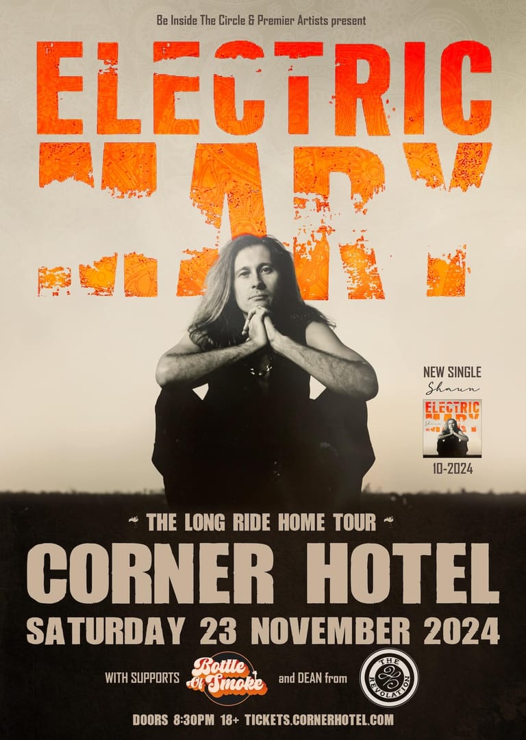 Black and white portrait of a contemplative musician overlaid with large orange "Electric Road" text, advertising a November 2024 Corner Hotel performance.