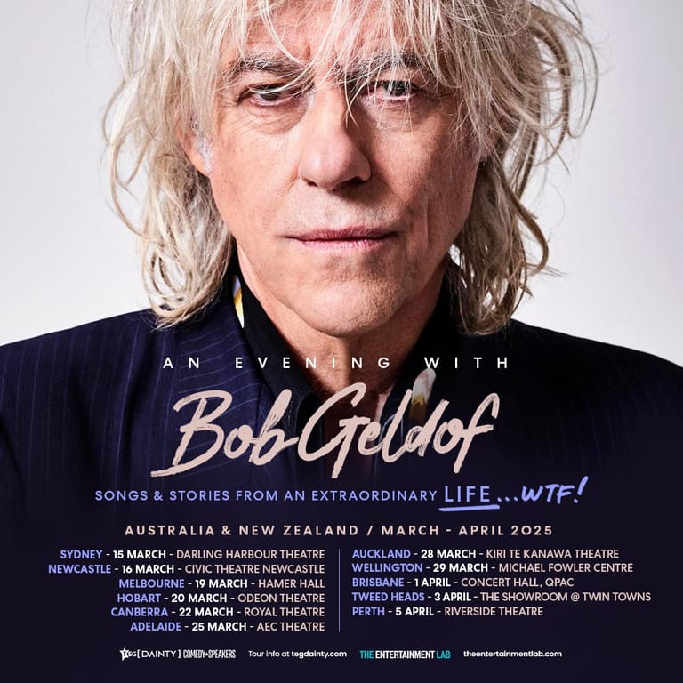 Older man with long grey hair wearing a dark pinstriped jacket against a white background, with tour dates listed below.