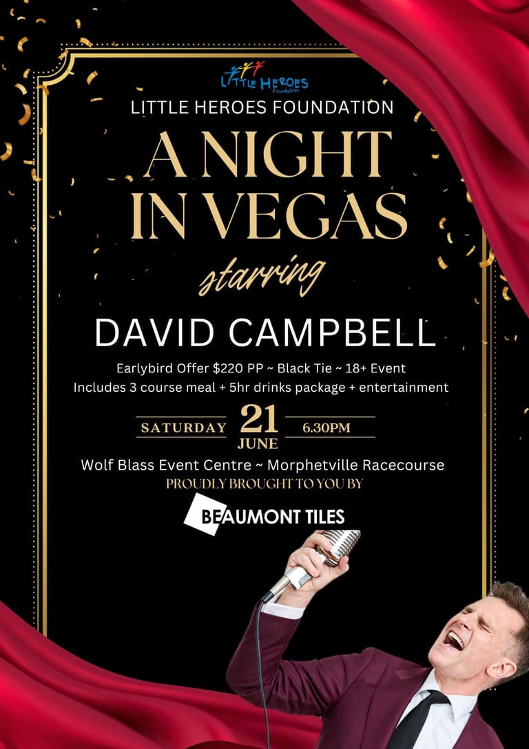 Man in burgundy suit and tie holding a microphone against black background with red velvet curtain and gold text promoting A Night in Vegas event.