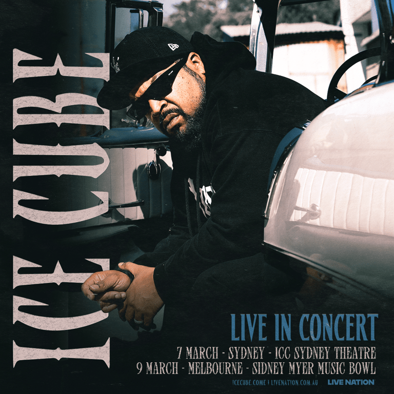 Person in black cap and hoodie leaning against vehicle, holding concert poster for Sydney and Melbourne dates.