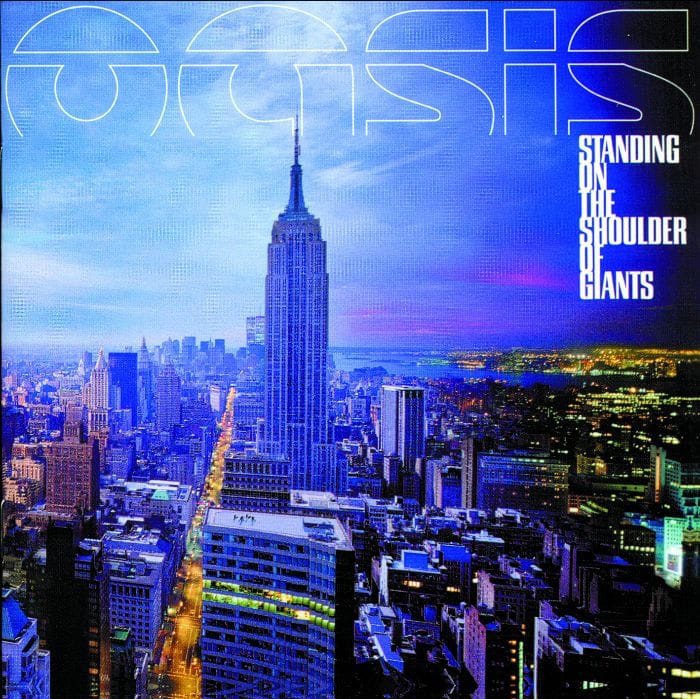 New York City skyline at dusk with Empire State Building prominent, overlaid with "OASIS" text and "Standing on the Shoulder of Giants" album title.