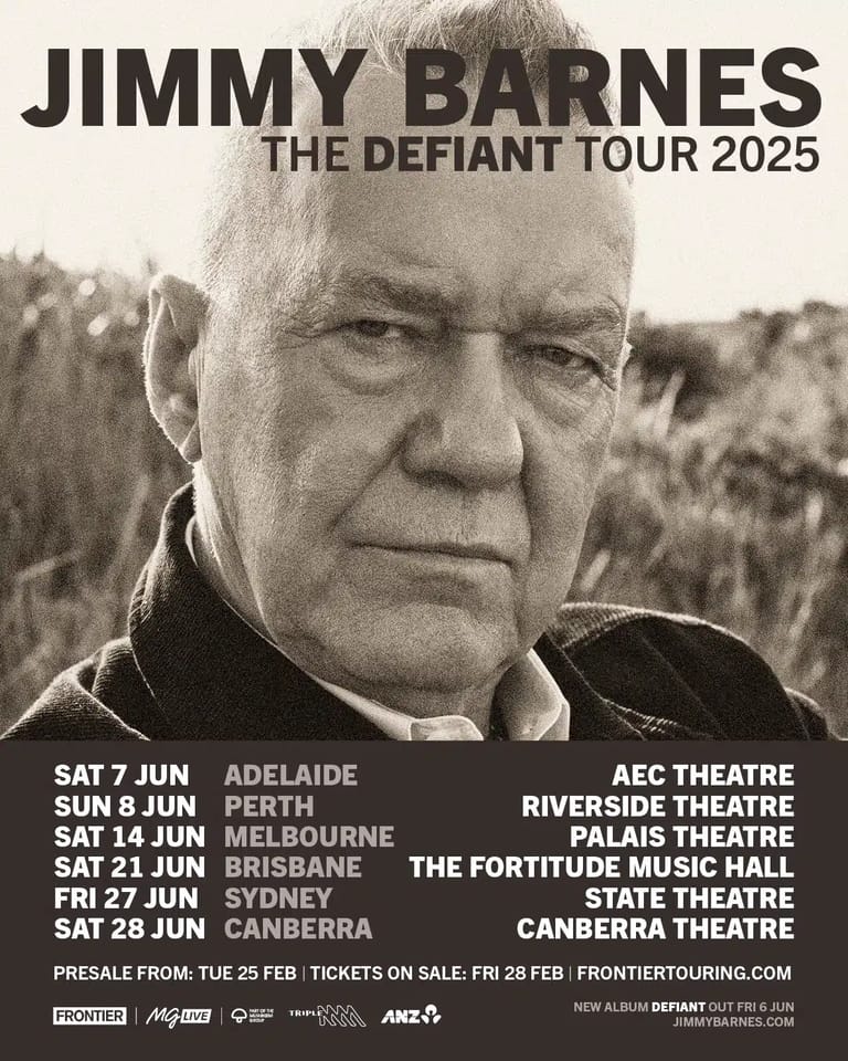 Grey-haired man in dark jacket gazes directly at camera in rural outdoor setting for Jimmy Barnes' Defiant Tour 2025.
