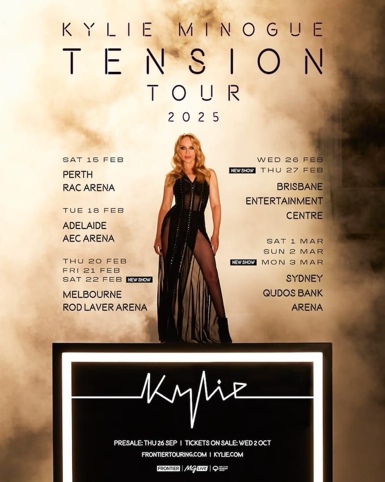 Kylie Minogue stands in a black pleated dress against a warm, blurred background promoting her Tension Tour 2025 across Australian cities.