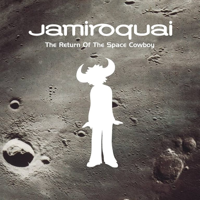 White silhouette figure with horns standing on a textured lunar surface for Jamiroquai's album "The Return Of The Space Cowboy".