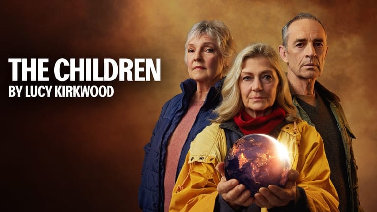 Three actors stand against a warm amber backdrop, the centre figure holding a glowing orb, with "The Children by Lucy Kirkwood" text overlay.