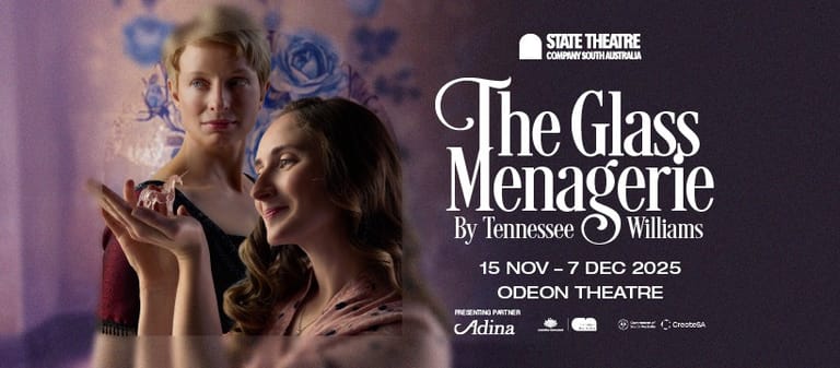 Two performers in close proximity against a purple-lit backdrop for State Theatre Company's production of The Glass Menagerie.