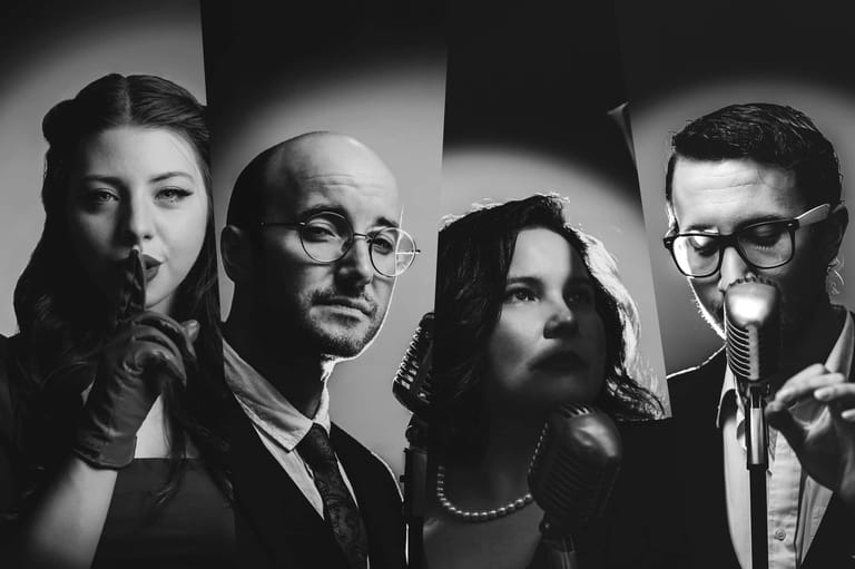 Four musicians in black and white portrait, each holding instruments to their mouths against dramatic striped lighting.