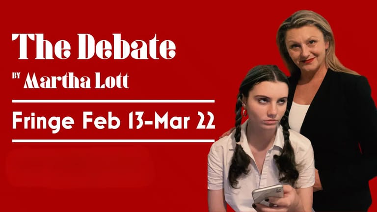 Two performers stand against a bright red background, one seated holding a tablet and one standing behind, for "The Debate" theatre production.