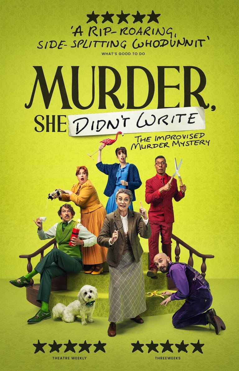Seven performers in colourful costumes pose playfully with props on a bright yellow background for the improvisational murder mystery show.