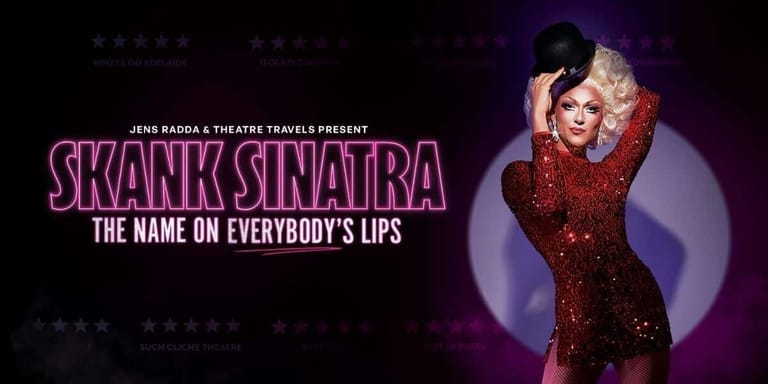 Performer in a red sequinned gown strikes a pose against purple stage lighting for Skank Sinatra production.