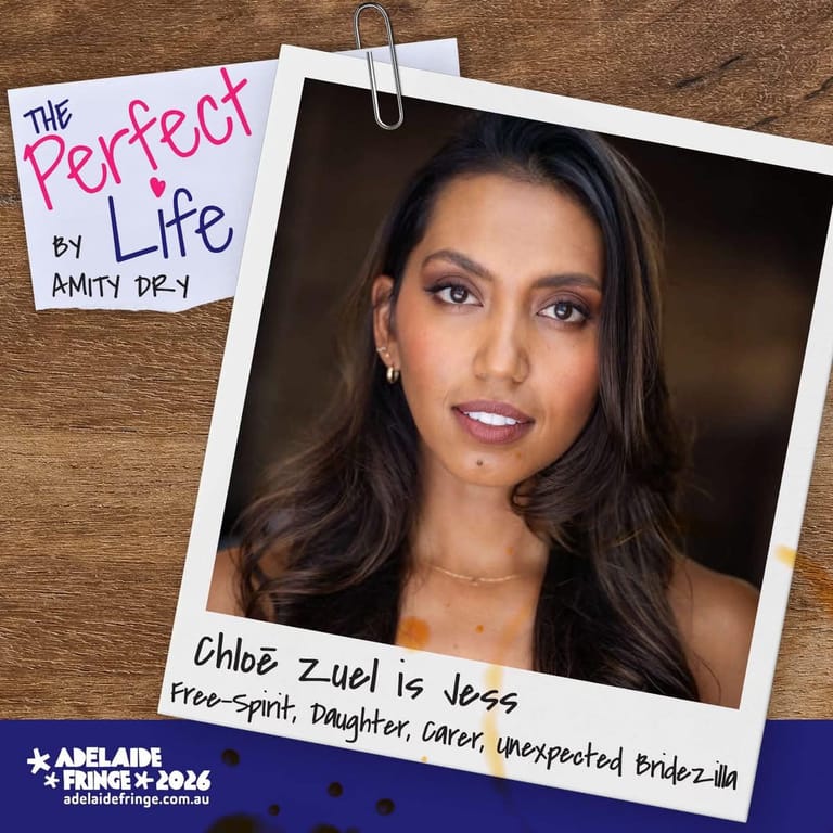 Polaroid-style photograph of a woman with long dark hair and a handwritten label describing her character, pinned to a wooden surface.