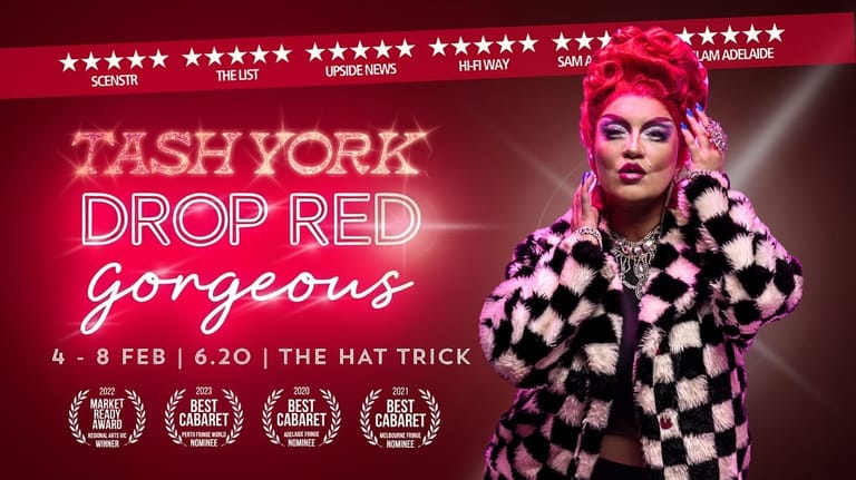 Tash York in a black and white checkered jacket poses against a neon pink backdrop promoting Drop Red Gorgeous.