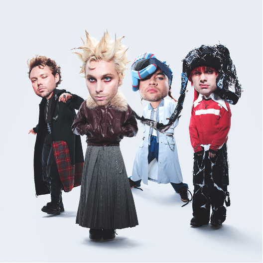Four performers in distinctive 1980s punk and new wave costumes stand against a white background.
