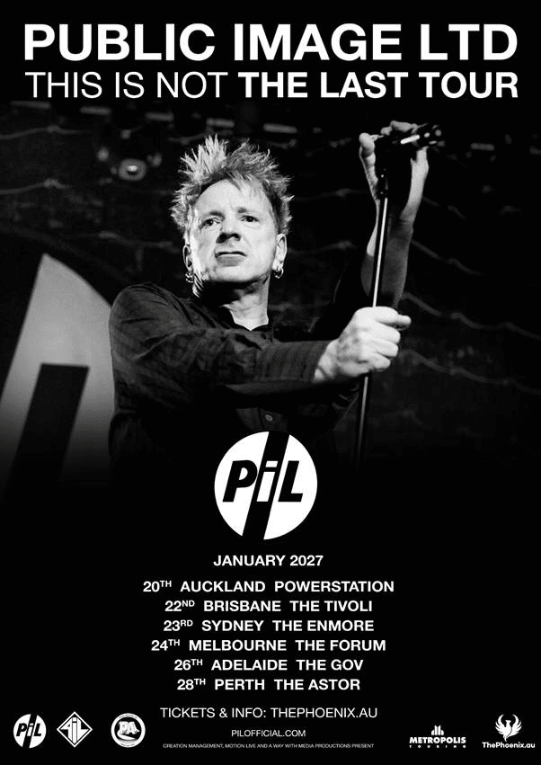 Punk rock performer gripping microphone stand during stage performance, black and white tour promotional image.