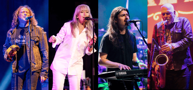 Four musicians perform on stage during a tour, featuring vocals, keyboards, and saxophone under coloured stage lighting.