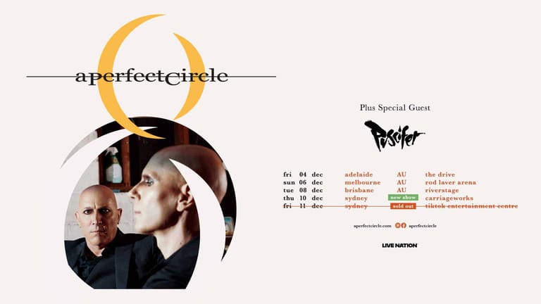A Perfect Circle tour poster featuring two band members' faces within a circular design with gold and black curved lines.