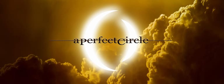 A Perfect Circle logo glows as a bright diamond shape surrounded by golden clouds.