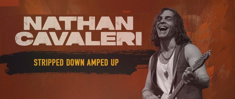 Nathan Cavaleri smiles whilst holding a guitar against an orange backdrop with tour title text.
