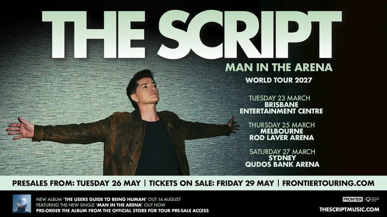 Male performer with arms outstretched on stage during The Script's World Tour 2027.