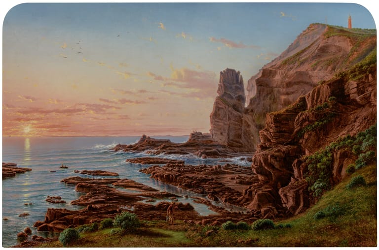 Dramatic coastal rock formations and cliffs at sunset with calm ocean and golden light.