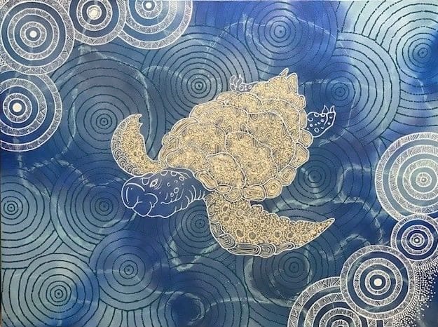 Gold leaf dove against blue circular patterned background in contemporary artwork.