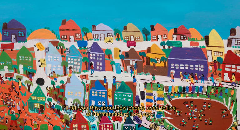 Colourful illustrated townscape with stacked buildings in bright hues beneath a blue sky.