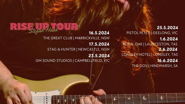 Musician's hands playing a gold-coloured electric guitar against a warm, dark background with tour dates displayed.