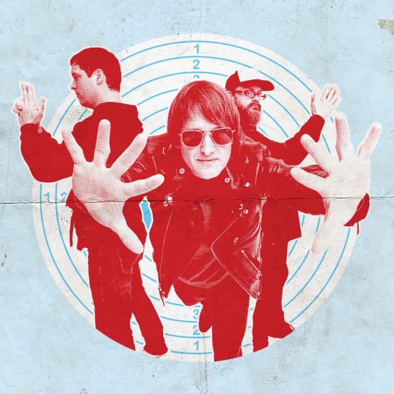 Three figures in red silhouettes with raised hands arranged within concentric circles on a textured white wall.