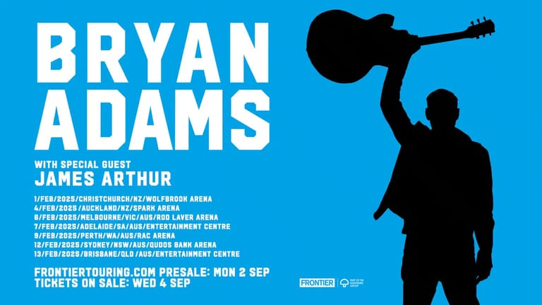 Bryan Adams silhouette holding guitar aloft against bright blue concert tour promotional background.