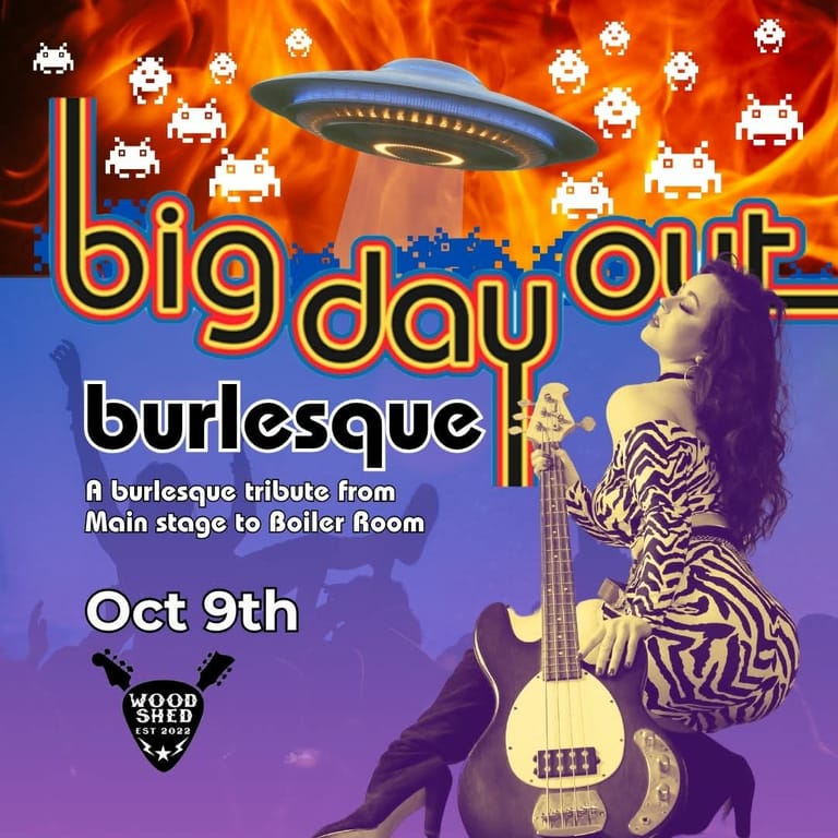 Performer in zebra-print jacket holds bass guitar against colourful retro space-themed graphic with UFO and arcade game sprites.