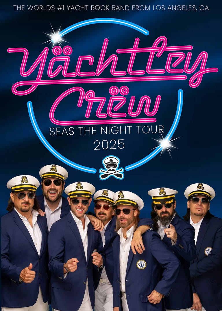 Yacht rock band members in coordinated naval-themed outfits pose beneath neon signage for the "Seas The Night Tour 2025".