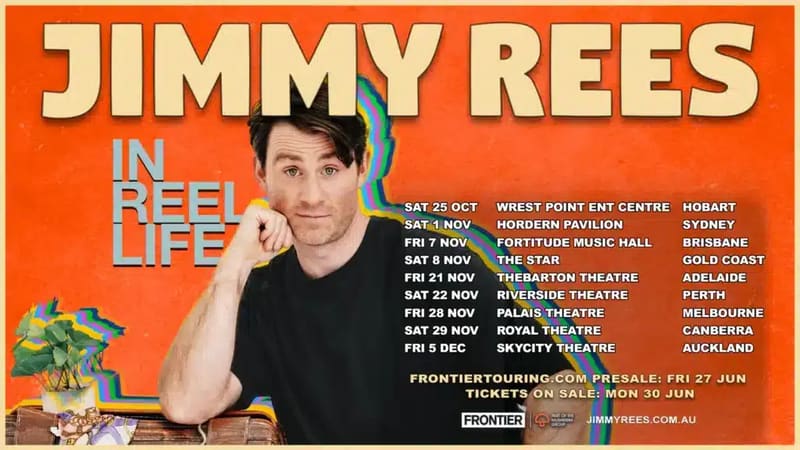 Man in dark jacket gestures expressively against orange background with bold white exhibition title and tour dates listed.