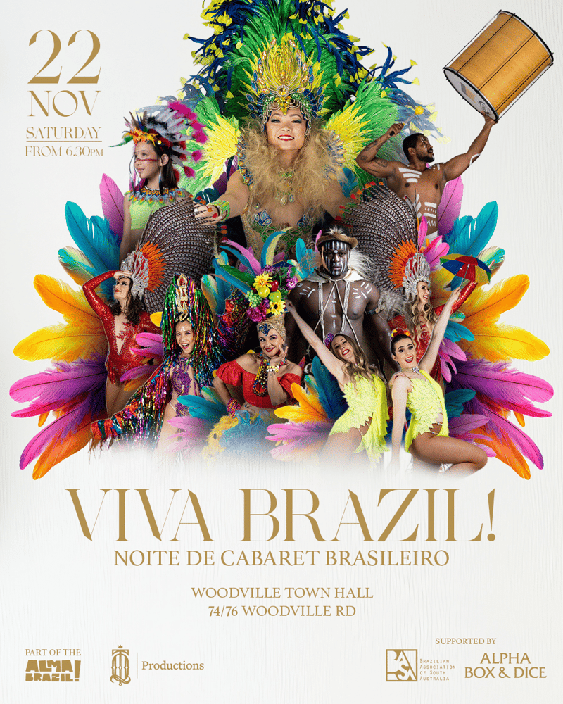 Vibrant carnival performers in elaborate feathered headdresses and colourful costumes pose against a backdrop of oversized tropical flowers.