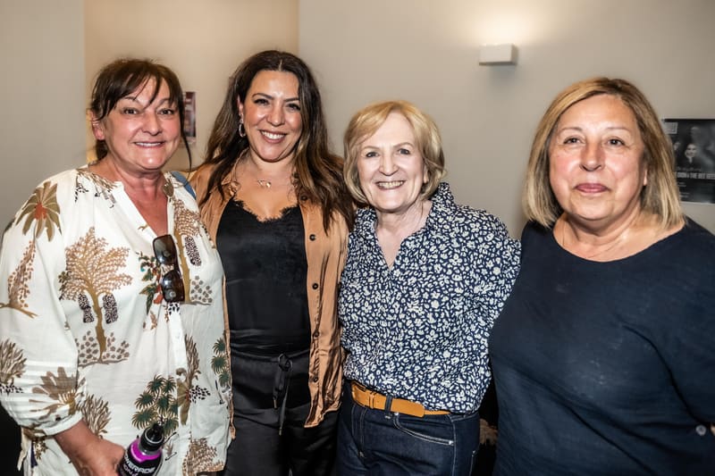 Four women posing together at Shaun Holton & Friends gallery event in Adelaide.